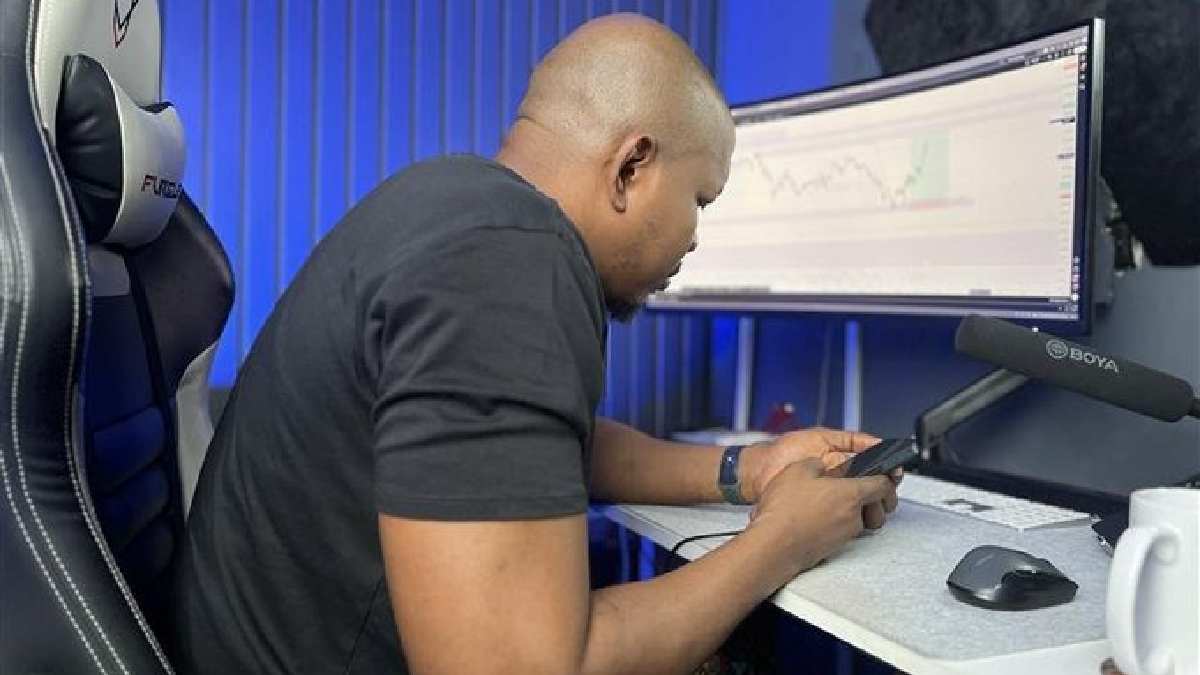 Trader analyzing stock charts with risk management strategy